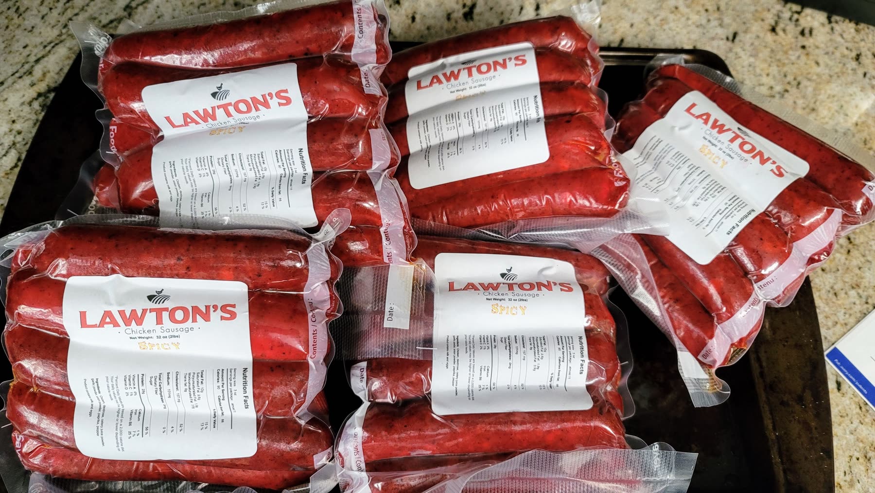 Cases of Lawton's chicken sausage packed and ready