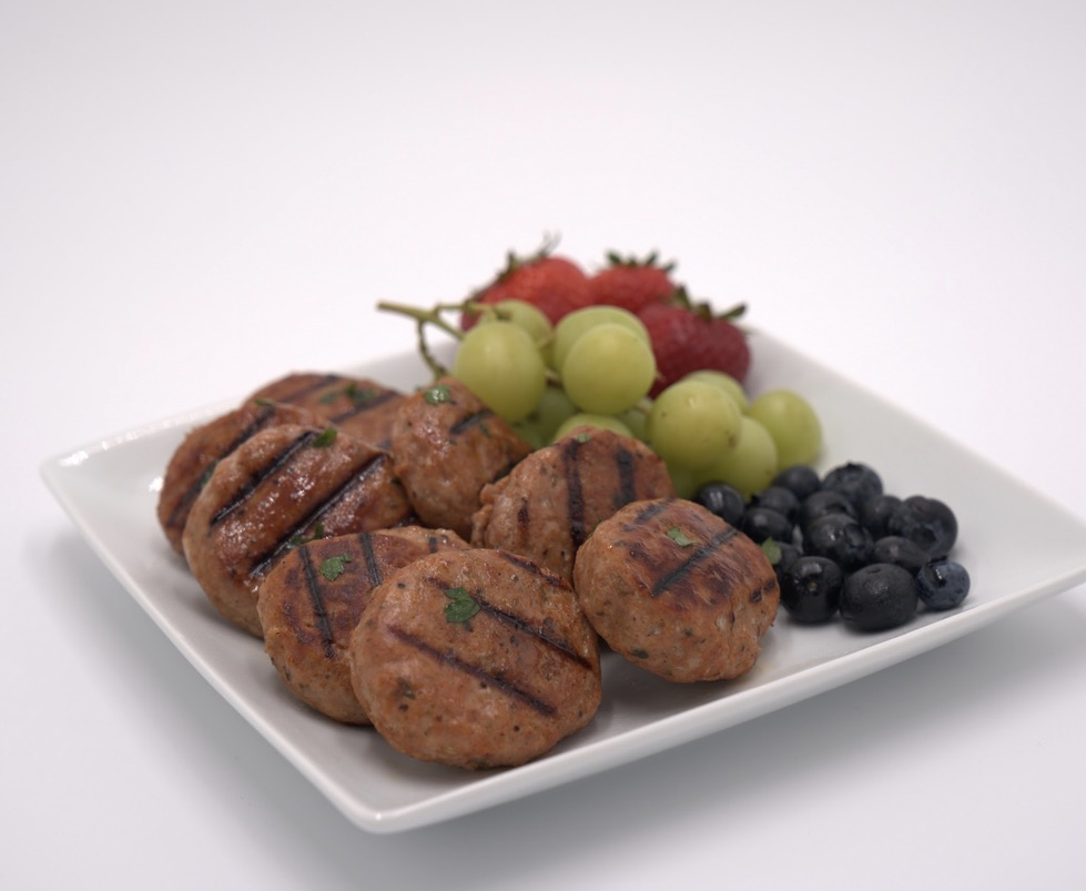 Grilled chicken sausage breakfast patties with fresh fruit